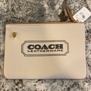 NEW COACH CLUTCH